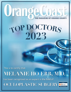 Magazine cover reads “Orange Coast Top Doctors 2023” with a stethoscope image and text recognizing Melanie Ho Erb, M.D. as an expert in oculoplastic surgery.